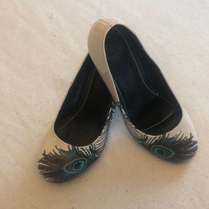 Pair of tuk brand shoes